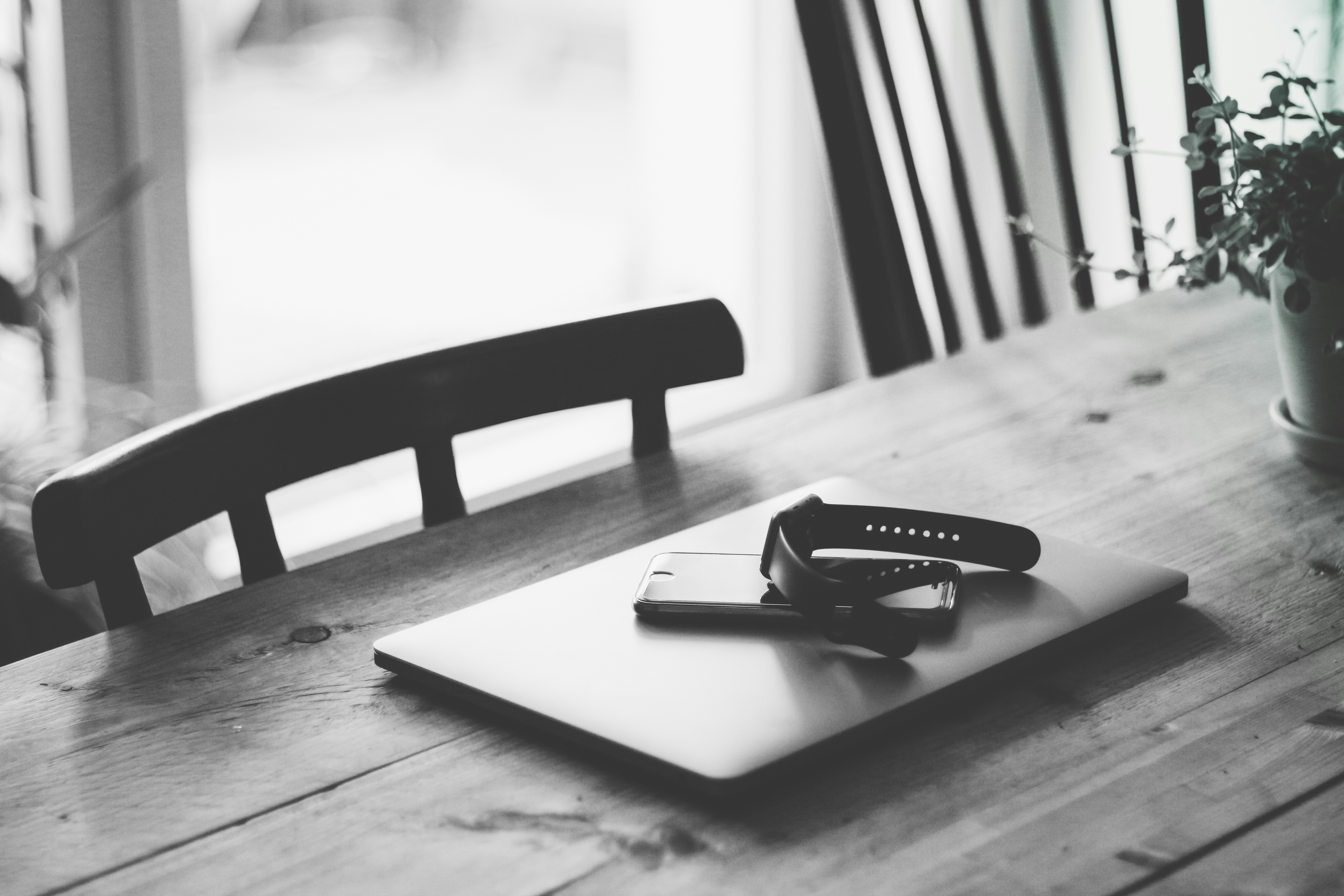 Apple Watch on top of laptop computer